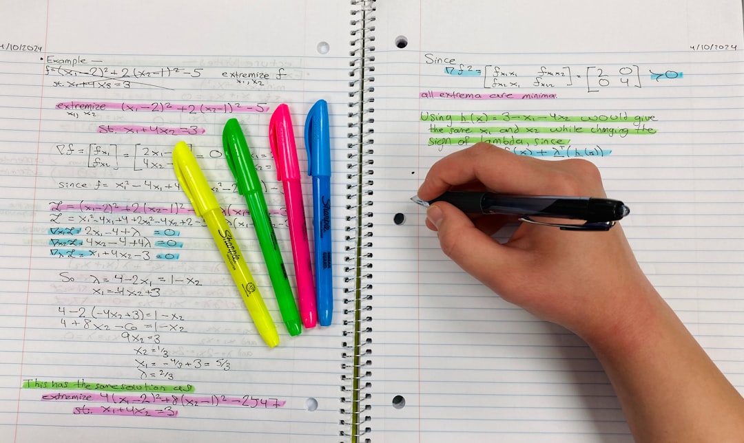 Handwritten study notes annotated with colored highlighters and a pen