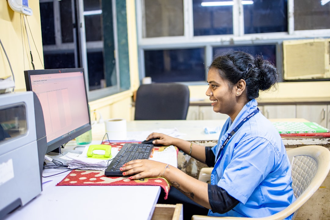 Nursing student working a Next Gen NCLEX case study on a computer