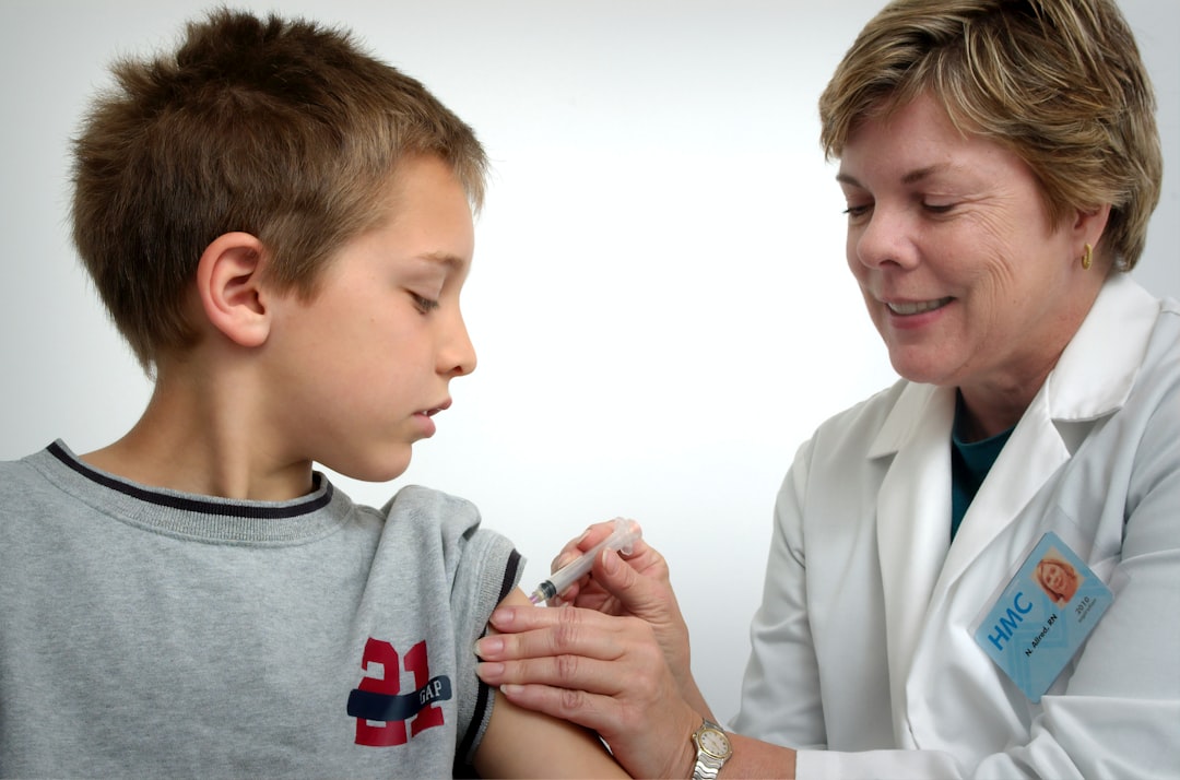 Nurse administering a childhood immunization, one of the core HESI Pediatrics content areas