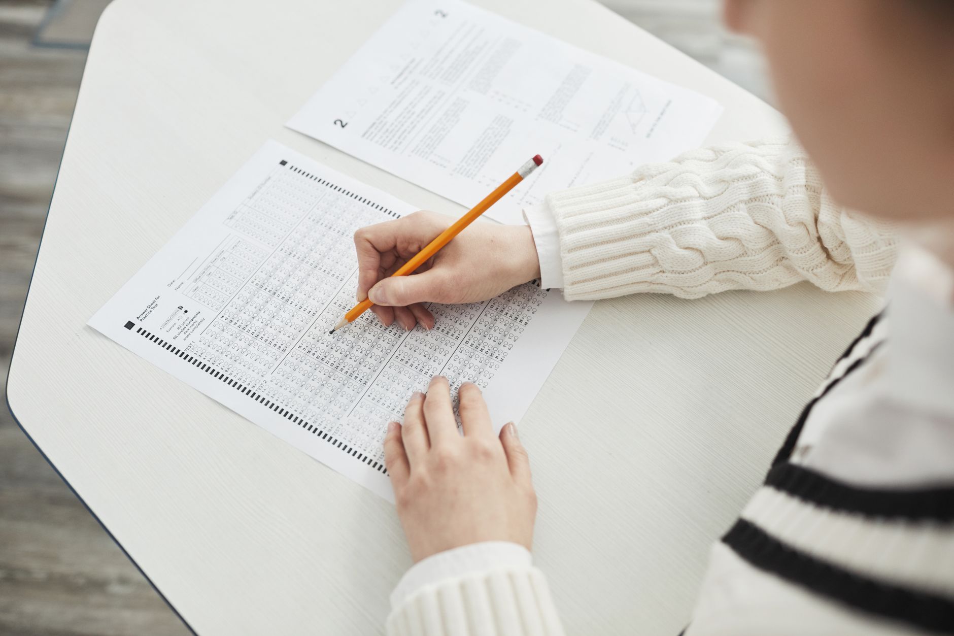 Candidate sitting a timed nursing exam, the application skill a question bank trains