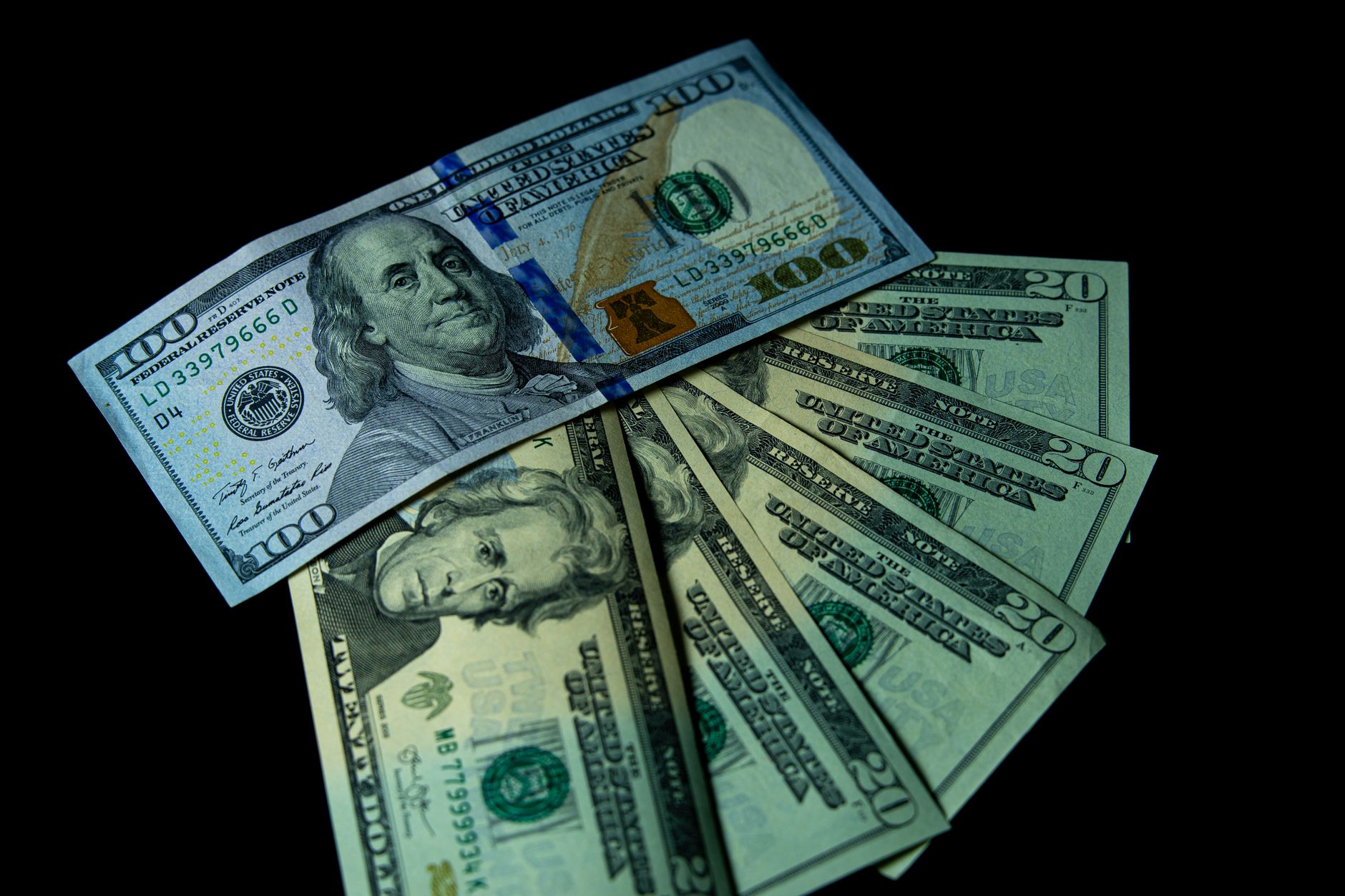 US dollar bills representing the non-refundable NCLEX registration fee
