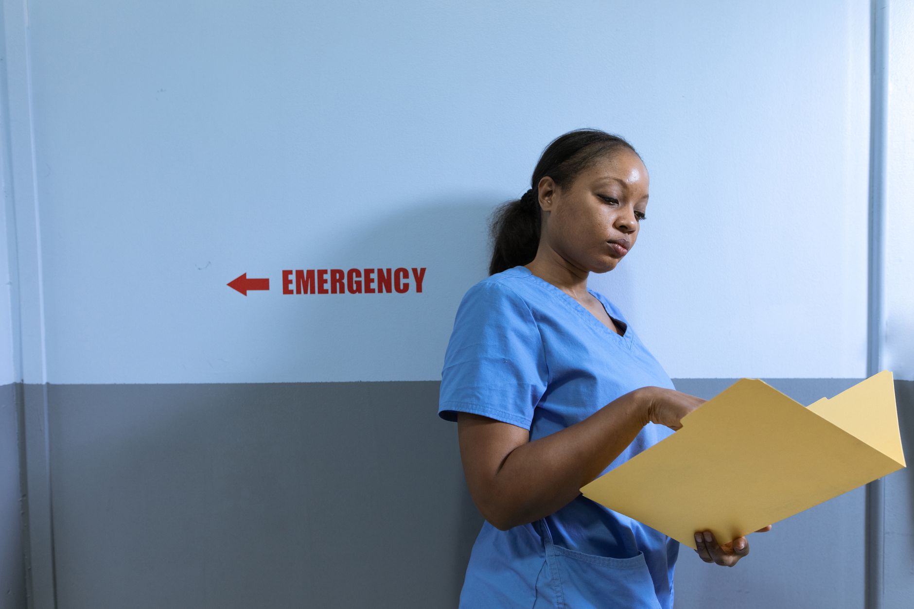 Newly graduated nurse working on a hospital ward under a New York limited permit