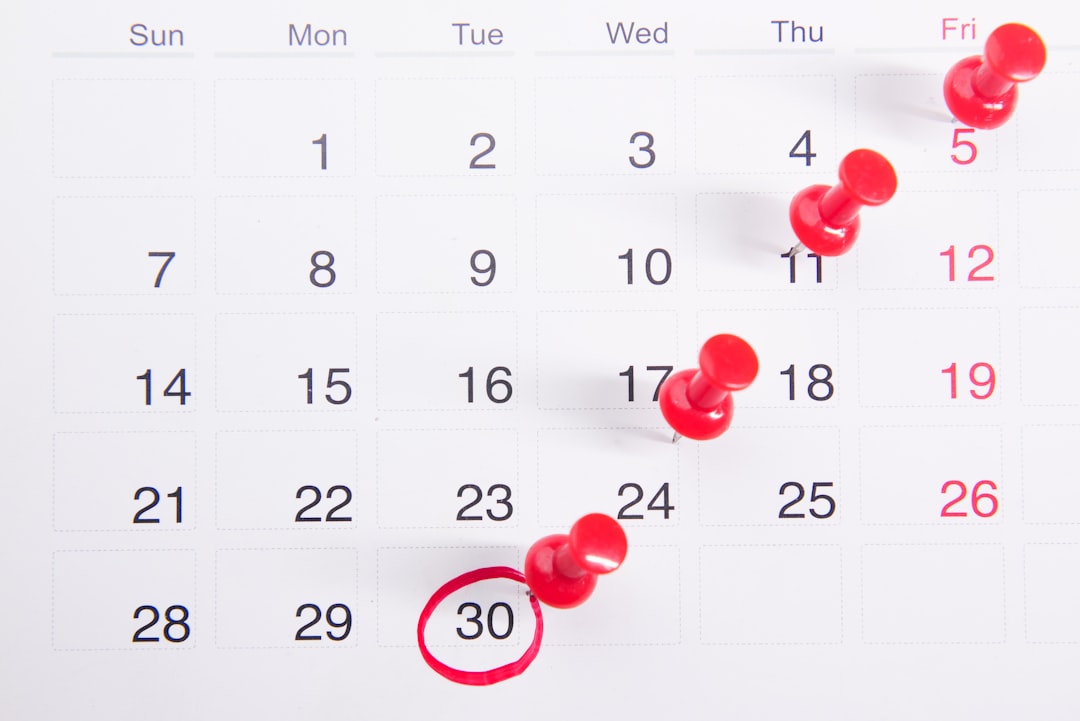 Calendar with pinned dates representing the wait for an official board posting