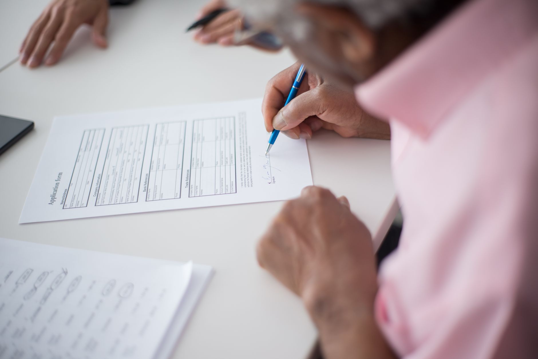 Completing a re-registration application form for a second NCLEX attempt