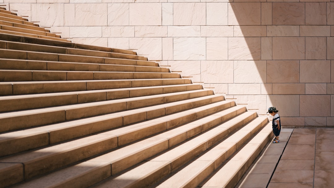 Wide flight of steps representing the staged sequence of nursing exams
