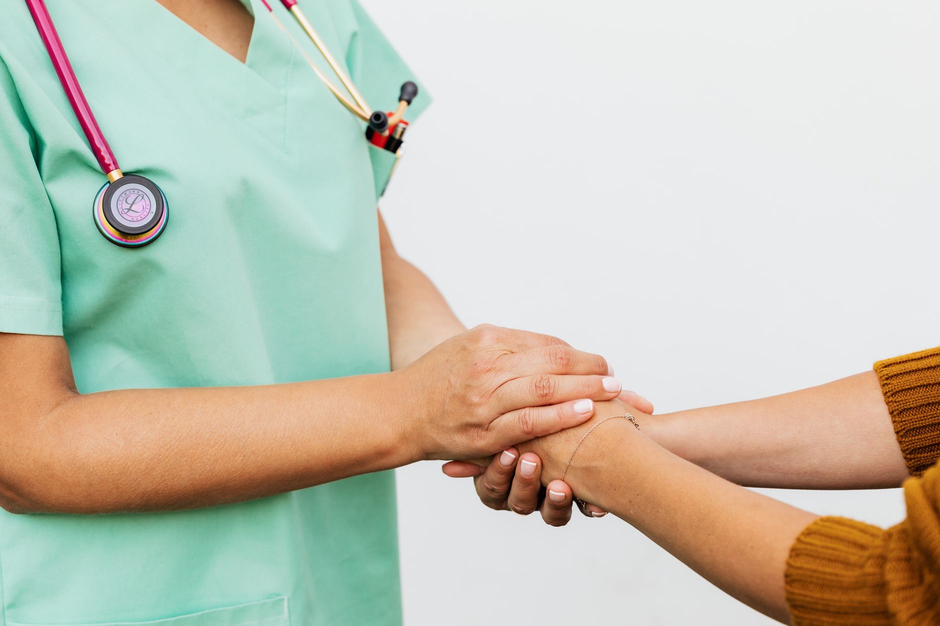 Oncology nurse supporting a patient through a course of treatment